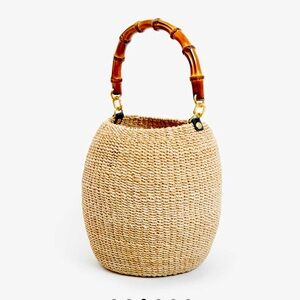 Clare V Pot De Miel with black leather handle